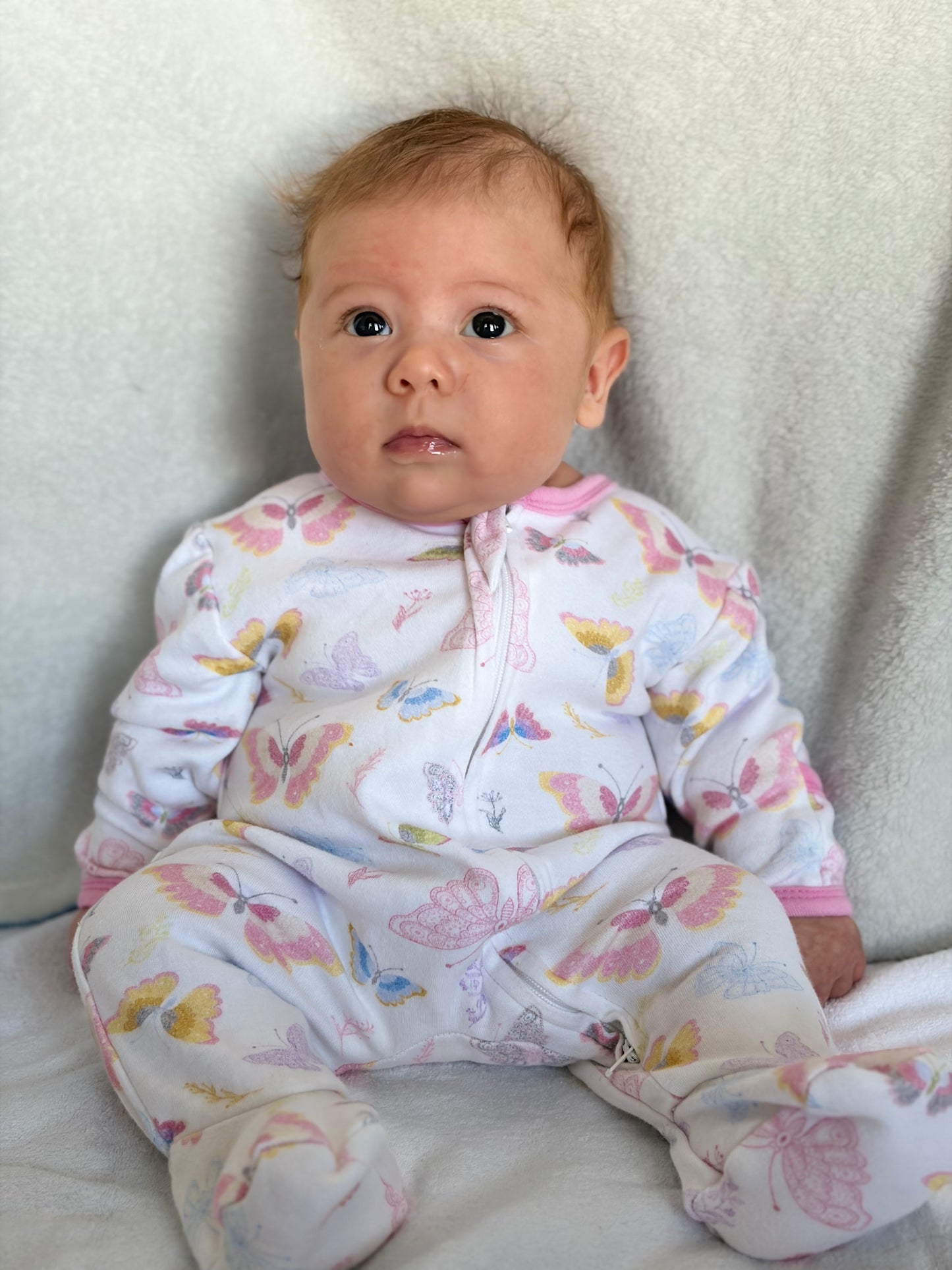 The Softest Two-Way Zipper Sleeper Made With Organic Cotton In Our Butterfly Print - CARLOMAR